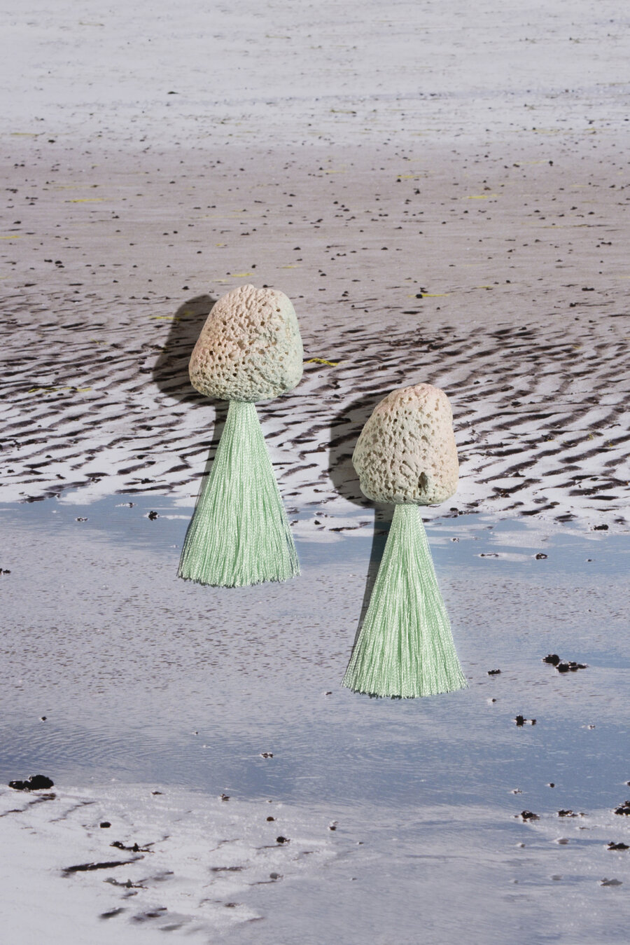 Print of beach scape with Kate Trouw earrings on top