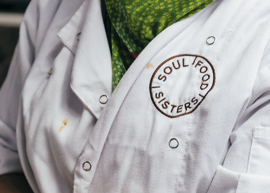 The Soul Food Sisters logo on a chefs apron
